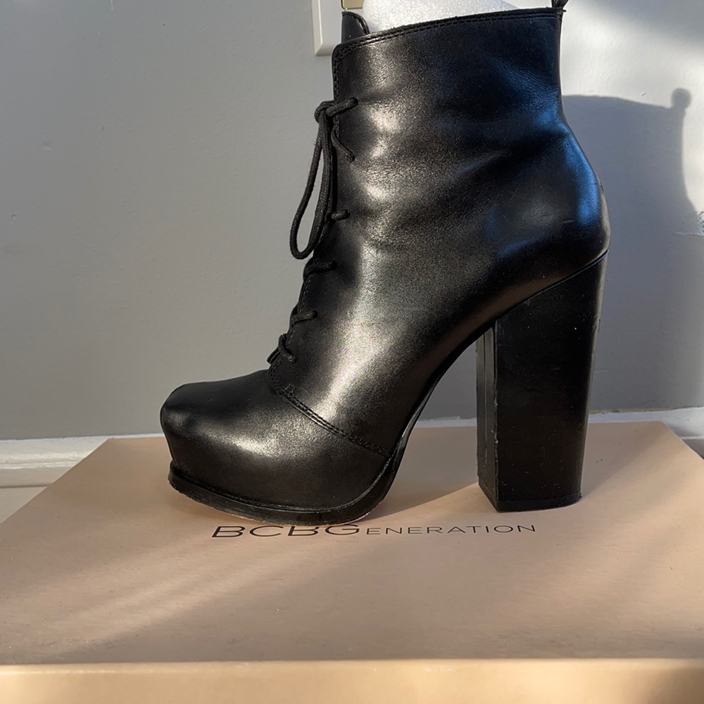 BCBGeberation black silky leather lace up booties. Good condition. Block heel.